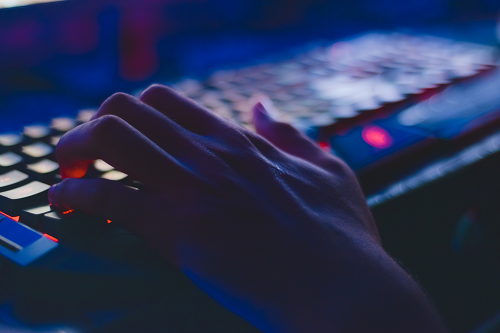 A person typing on a computer.